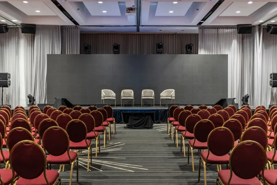 Conference stage viewed from the centre aisle